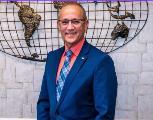 Picture of smiling man with glasses